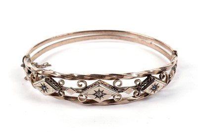 Lot 488 - A gold, sapphire, and diamond bangle