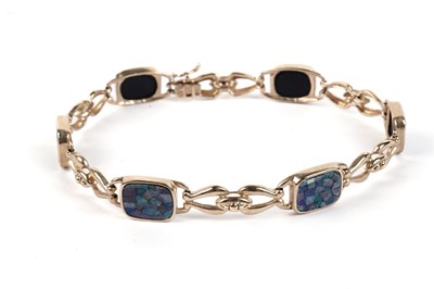 Lot 492 - A composite opal and 9ct yellow gold bracelet