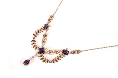 Lot 1240 - An Edwardian amethyst and seed pearl necklace