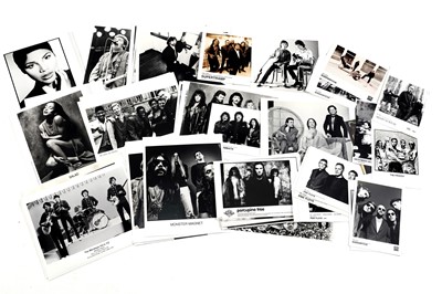 Lot 1404 - Record label promotional black and white photographs of bands and musicians