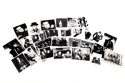 Lot 1405 - Record label promotional black and white photographs of bands and musicians