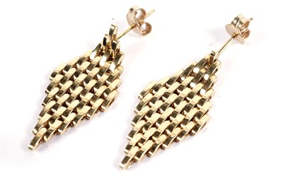 Lot 597 - A pair of yellow gold drop earrings