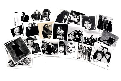 Lot 1415 - Record label promotional black and white photographs of bands and musicians