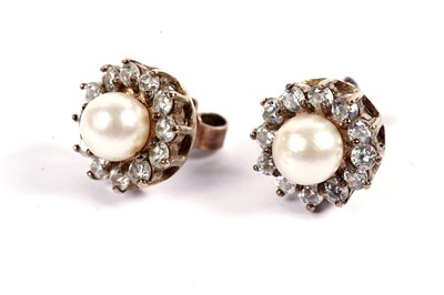 Lot 606 - A pair of cultured pearl and white stone cluster earrings; and a similar brooch