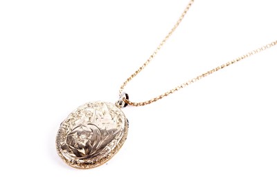 Lot 622 - A Victorian rose gold bar brooch; and a locket on chain
