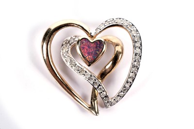 Lot 612 - An opal and diamond heart pendant