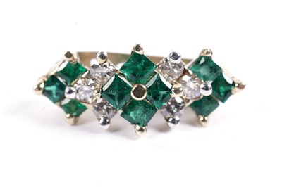 Lot 613 - An emerald and diamond pendant