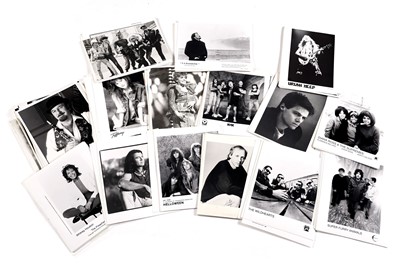 Lot 1417 - Record label promotional black and white photographs of bands and musicians