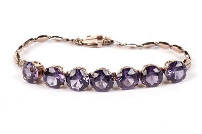 Lot 696 - A synthetic alexandrite bracelet