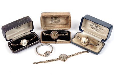 Lot 703 - A 9ct gold cased watch by Reid & Sons; and four others