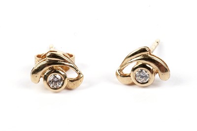 Lot 496 - A pair of diamond stud earrings