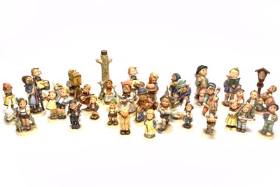 Lot 140 - A collection of Goebel Hummel figures