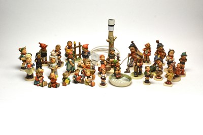 Lot 131 - A collection of Goebel Hummel figures