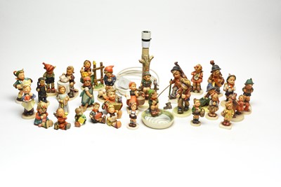 Lot 131 - A collection of Goebel Hummel figures