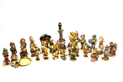 Lot 143 - A collection of Goebel Hummel figures