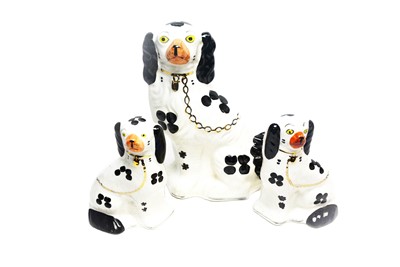 Lot 215 - Three Arthur Wood Staffordshire dogs