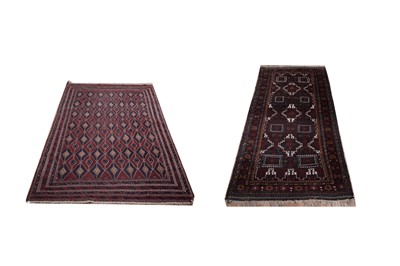 Lot 143 - An Afghan Caucasian rug; and another