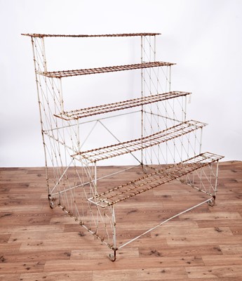 Lot 9 - A vintage wirework shop plant display stand