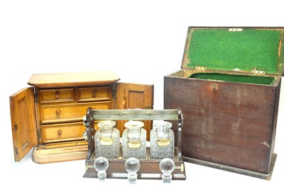 Lot 234 - Betjemanns of London three bottle Tantalus in fitted box; and a tabletop cabinet