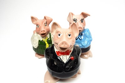 Lot 196 - A set of Wade NatWest ceramic money boxes