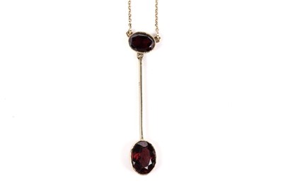 Lot 655 - A garnet drop necklace