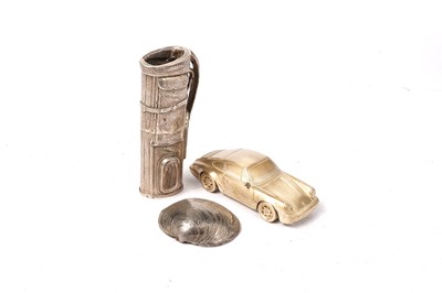 Lot 1748 - A cast silver miniature model of a golf bag; and other items