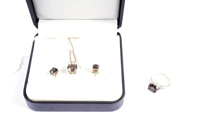 Lot 658 - A suite of smoky quartz jewellery