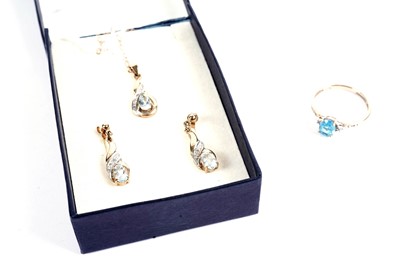 Lot 660 - A selection of topaz and diamond jewellery