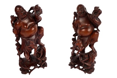 Lot 329 - A pair of Chinese carved root wood Buddha figures