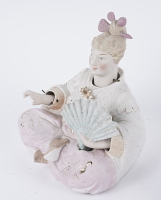 Lot 206 - A pair of German bisque figures with another nodding head figure