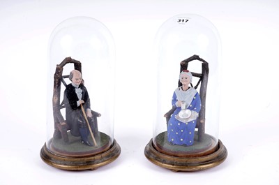 Lot 299 - A pair of bobble head figures