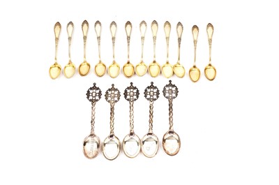 Lot 768 - A set of twelve 830 standard silver gilt coffee spoons