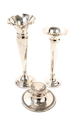 Lot 817 - A silver capstan form inkwell; and two silver trumpet vases