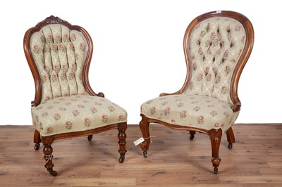 Lot 41 - Two Victorian mahogany balloon button-back nursing chairs