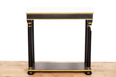 Lot 66 - A continental Empire-style ebonised and gold painted side table