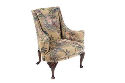 Lot 773 - A Georgian style mahogany framed wingback armchair