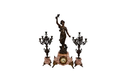 Lot 677 - A late 19th century French clock garniture