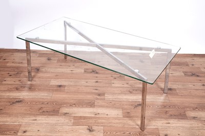 Lot 12 - A Barcelona style chrome and glass coffee table