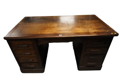 Lot 91 - An early 20th Century oak pedestal writing desk