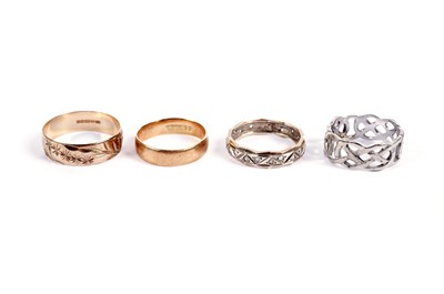 Lot 386 - Three 9ct gold rings; and an 18ct gold ring