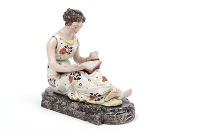 Lot 465 - A Staffordshire figure 'Reading'