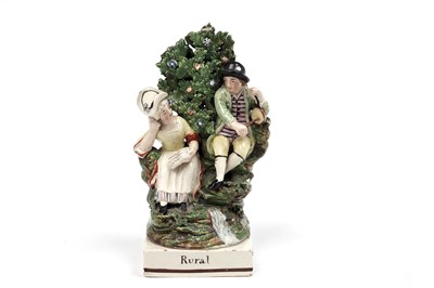 Lot 470 - A Staffordshire figure titled 'Rural'