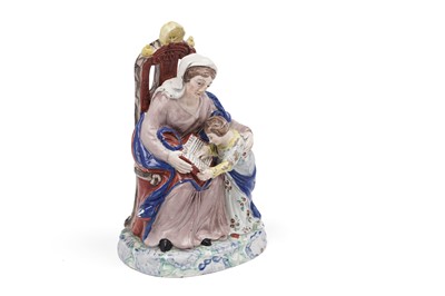 Lot 474 - A Staffordshire figure of Saint Anne