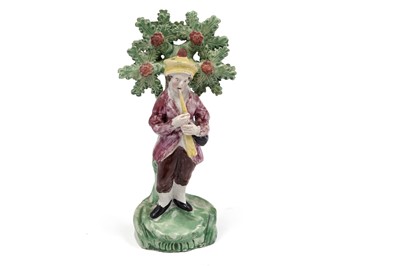 Lot 475 - A Staffordshire pearlware figure of a piper