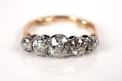 Lot 1250 - A Victorian five stone diamond ring