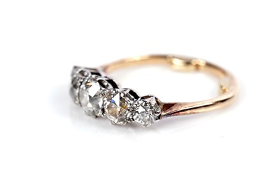 Lot 1250 - A Victorian five stone diamond ring