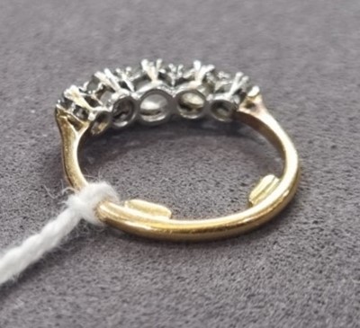 Lot 1250 - A Victorian five stone diamond ring