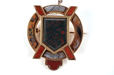 Lot 1071 - A Scottish hardstone and gold brooch