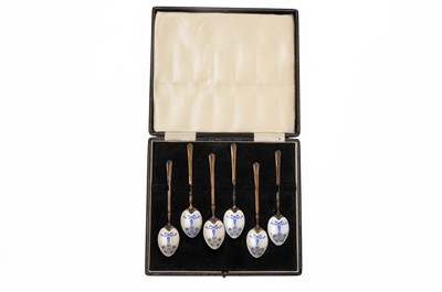 Lot 332 - A set of six silver gilt and enamel coffee spoons