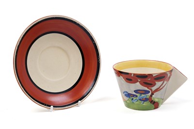 Lot 511 - A Clarice Cliff Bizarre Applique ‘Red Tree’ pattern teacup; and saucer